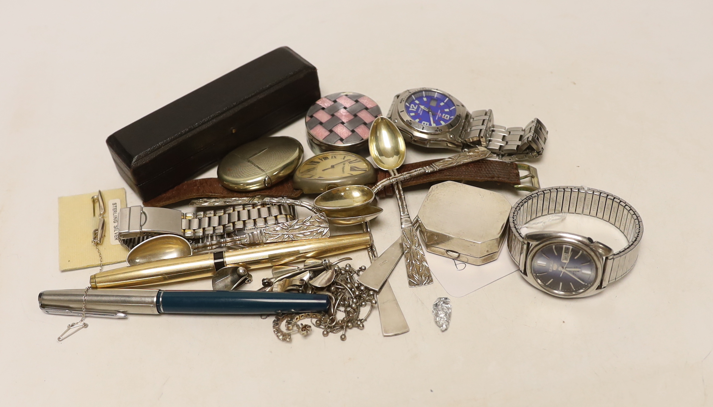 Miscellaneous items including a set of six Chinese white metal teaspoons by Wang Hing, 10.2cm, three assorted pens, silver and enamelled pill box and four assorted wrist watches including Seiko.